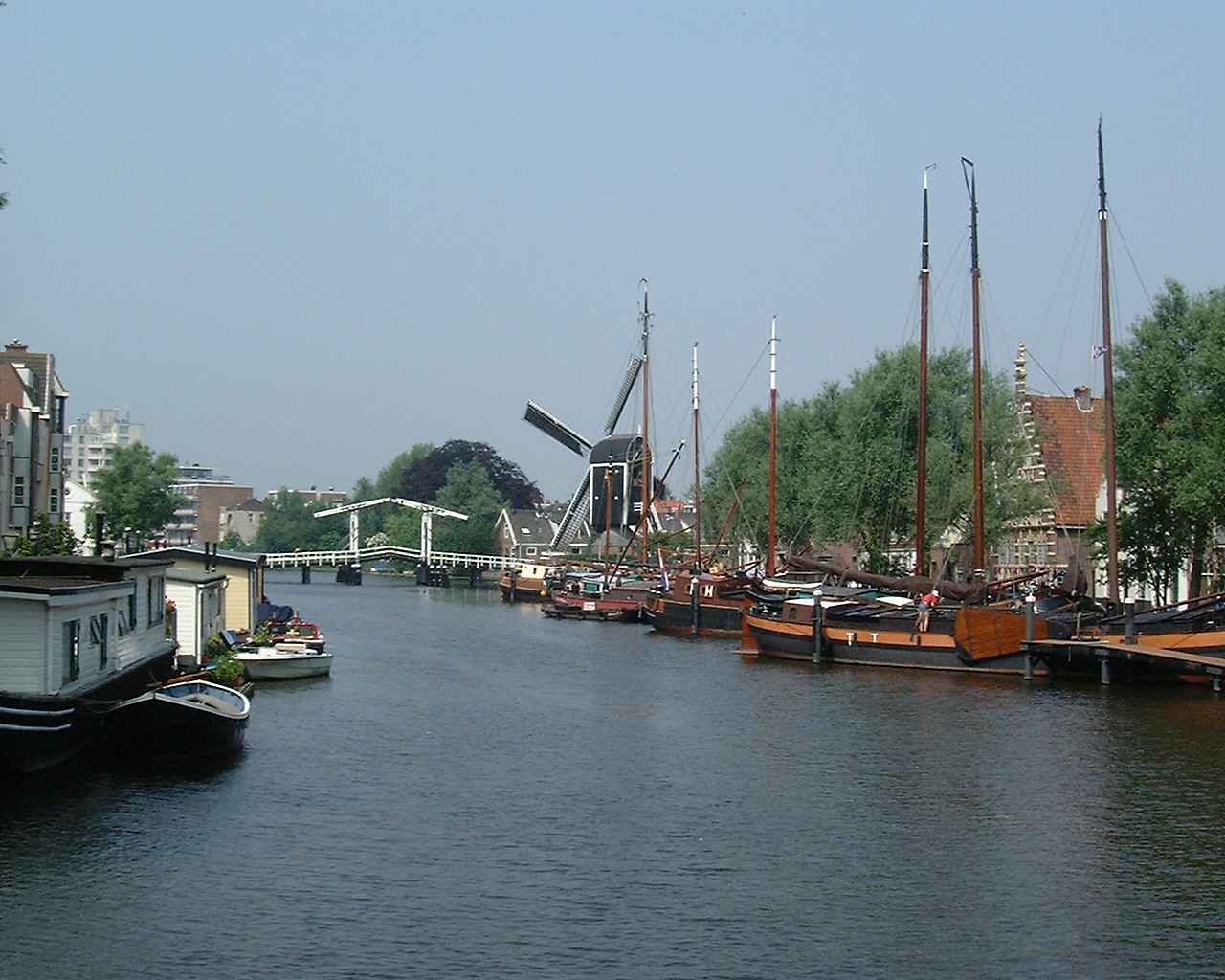 Galgewater with boats and a windmill in Leiden